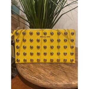 Michael KORS studded yellow wristlet